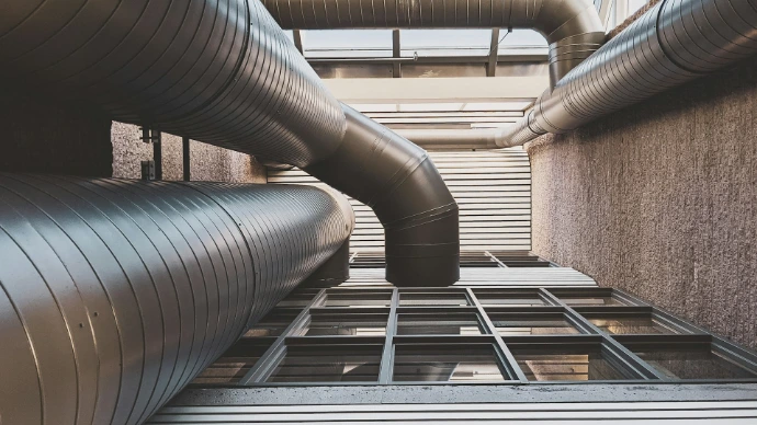 black and gray metal pipe